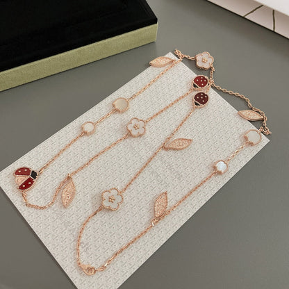 [Kincade Jewelrys] COLLIER LUCKY SPRING 15 MOTIFS EN OR ROSE