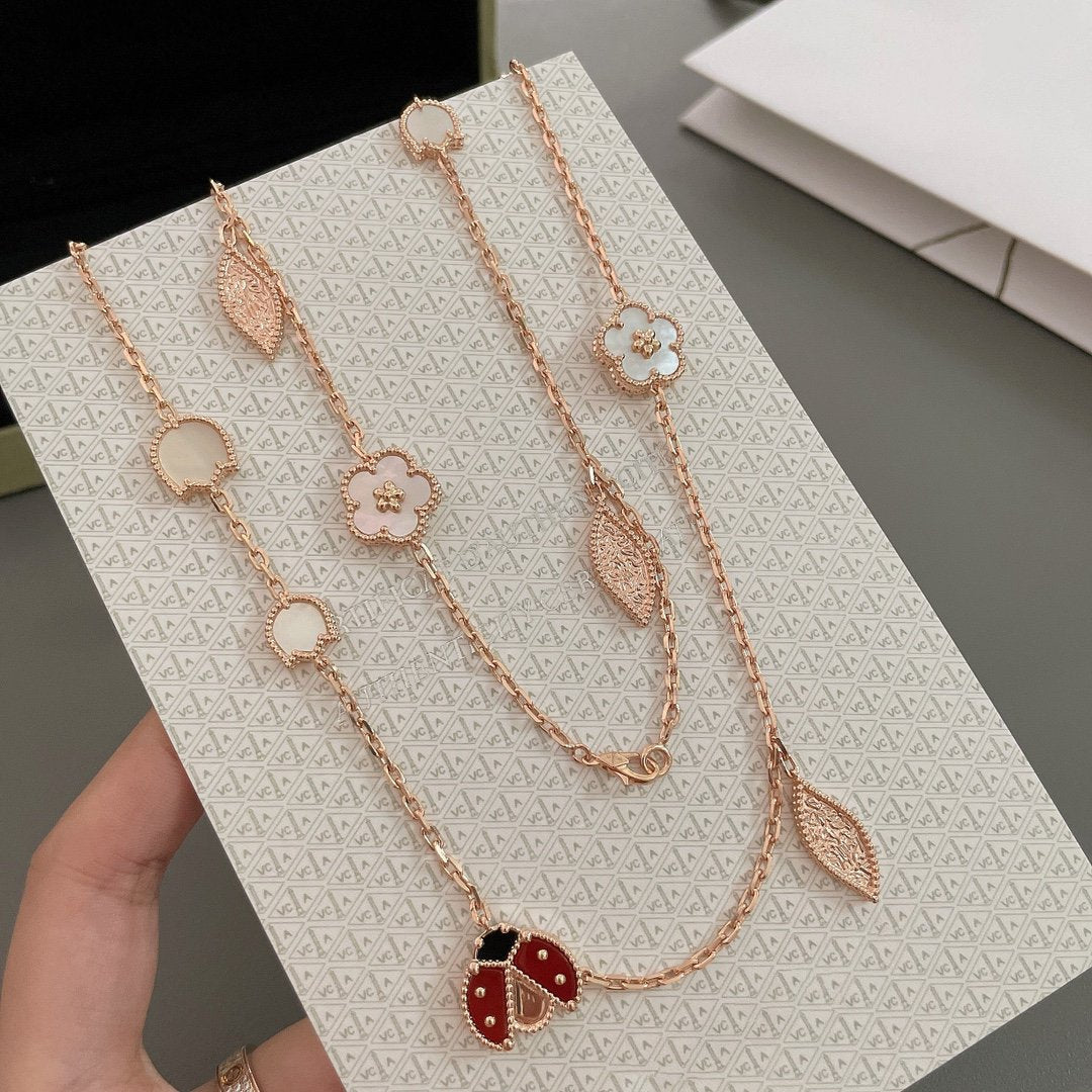 [Kincade Jewelrys] COLLIER LUCKY SPRING 15 MOTIFS EN OR ROSE