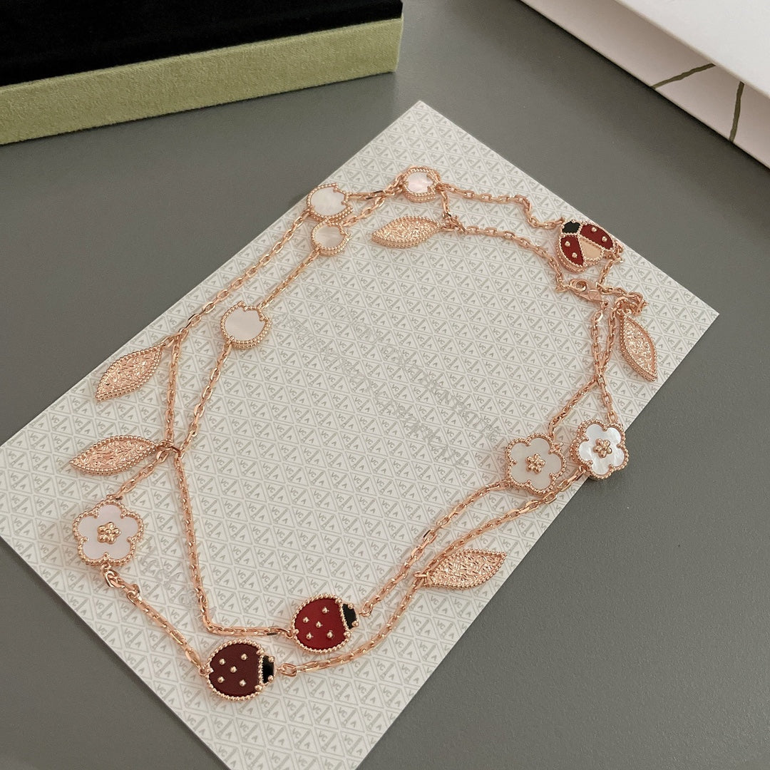 [Kincade Jewelrys] COLLIER LUCKY SPRING 15 MOTIFS EN OR ROSE