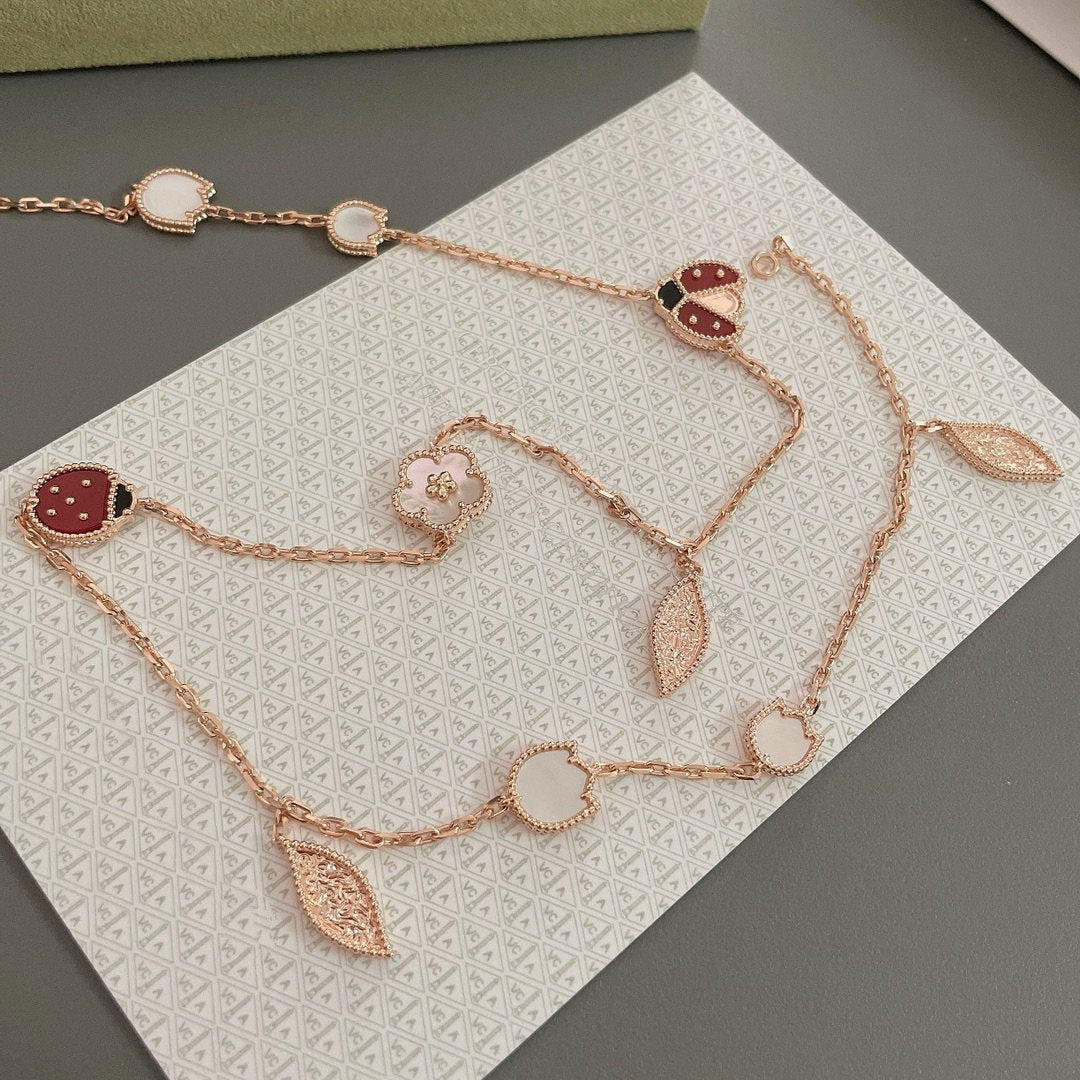 [Kincade Jewelrys] COLLIER LUCKY SPRING 15 MOTIFS EN OR ROSE