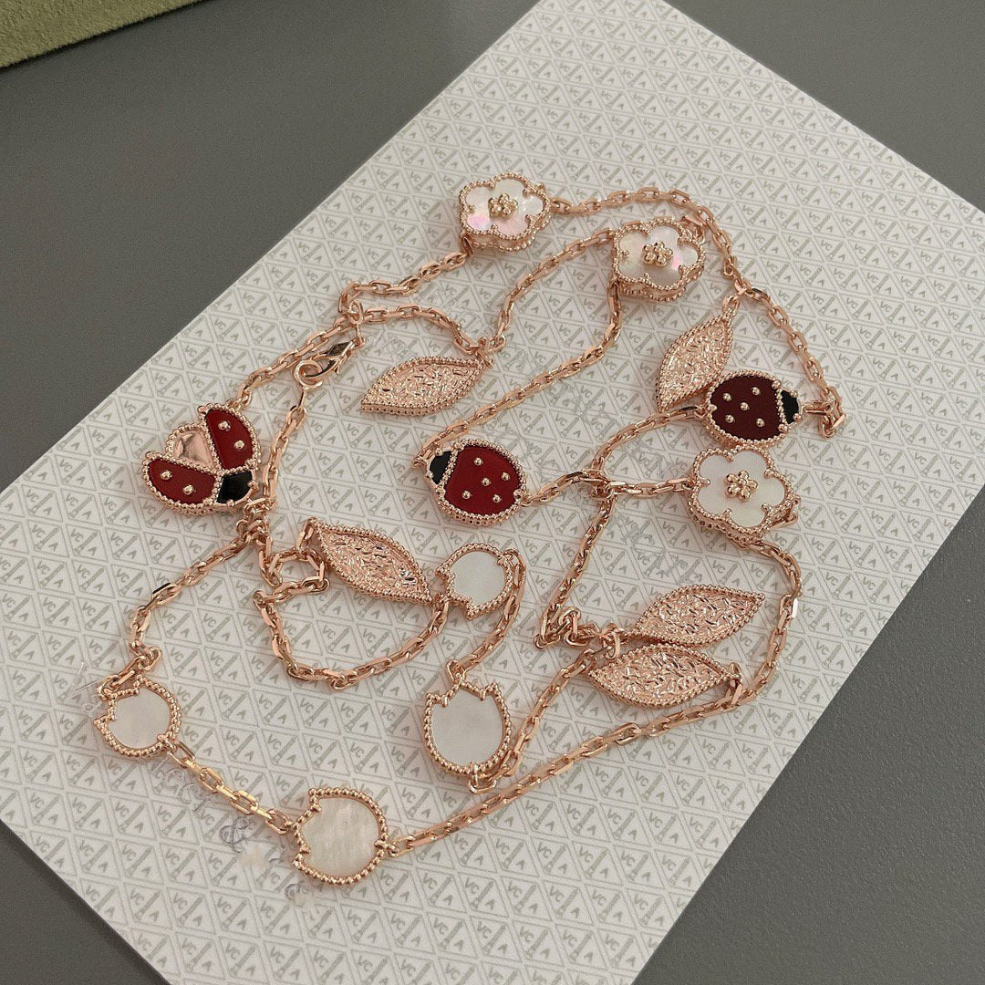 [Kincade Jewelrys] COLLIER LUCKY SPRING 15 MOTIFS EN OR ROSE