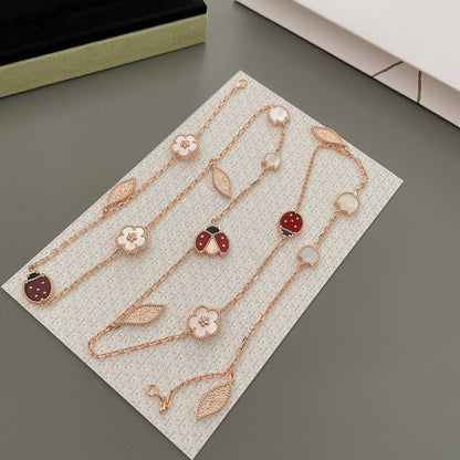 [Kincade Jewelrys] COLLIER LUCKY SPRING 15 MOTIFS EN OR ROSE