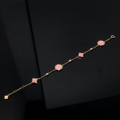 [Kincade Jewelrys] BRACELET EN OR ROSE AVEC 4 MOTIFS ÉTOILE ET SOLEIL 