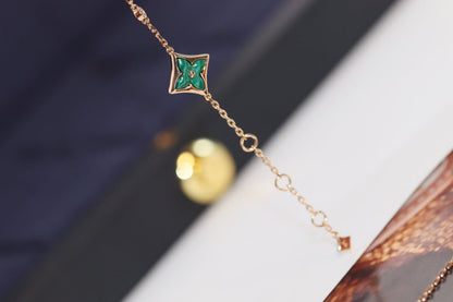 [Kincade Jewelrys] BRACELET 4 MOTIFS ÉTOILE ET SOLEIL EN OR ROSE ET MALACHITE