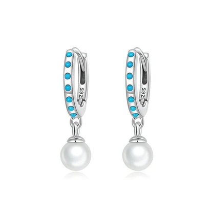 Boucles d'oreilles pendantes turquoise et perles de coquillage