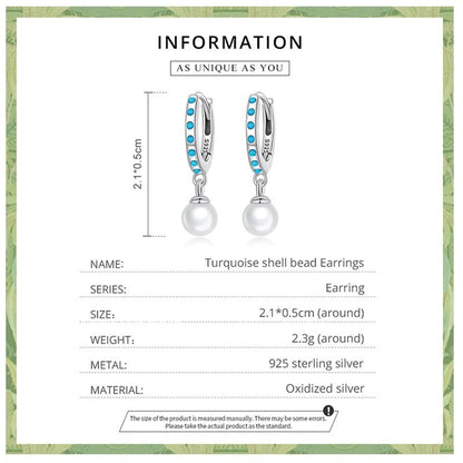 Boucles d'oreilles pendantes turquoise et perles de coquillage