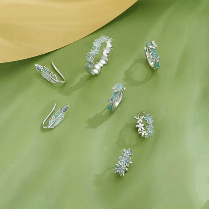 Boucles d'oreilles créoles en guirlande vert menthe et fleurs en émail